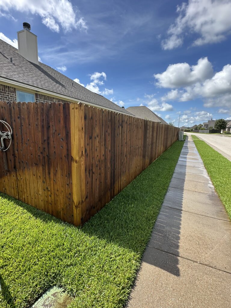 Fence wash removed old grey color in South College Station TX