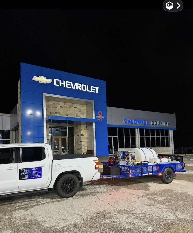Commercial building soft wash on a Chevrolet dealership in Caldwell, TX by 3G Pressure Pro