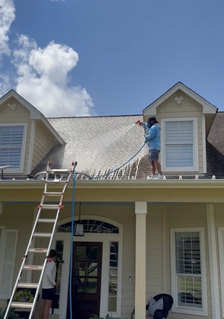 Roof soft wash on a two-story home in Washington TX