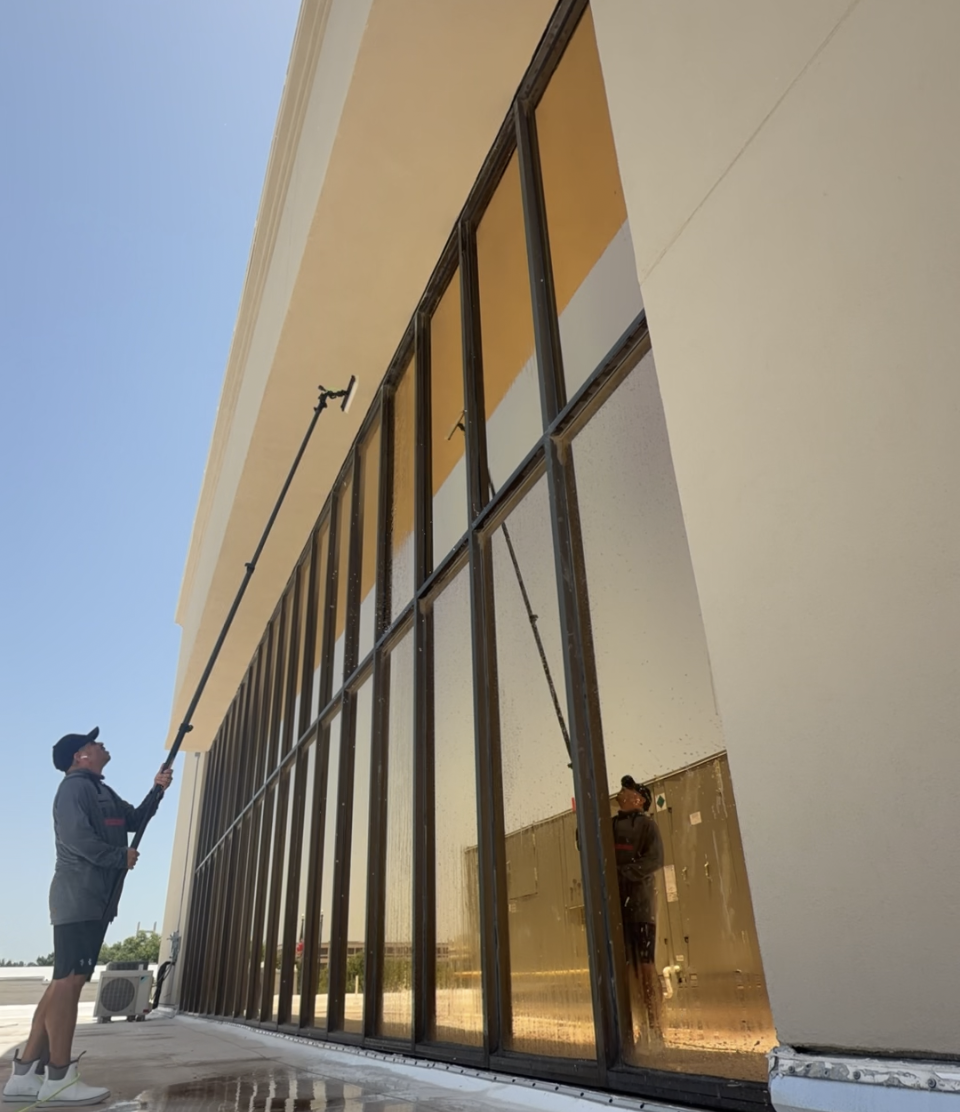 Water fed pole window cleaning on a commercial building in Temple, TX by 3G Pressure Pro