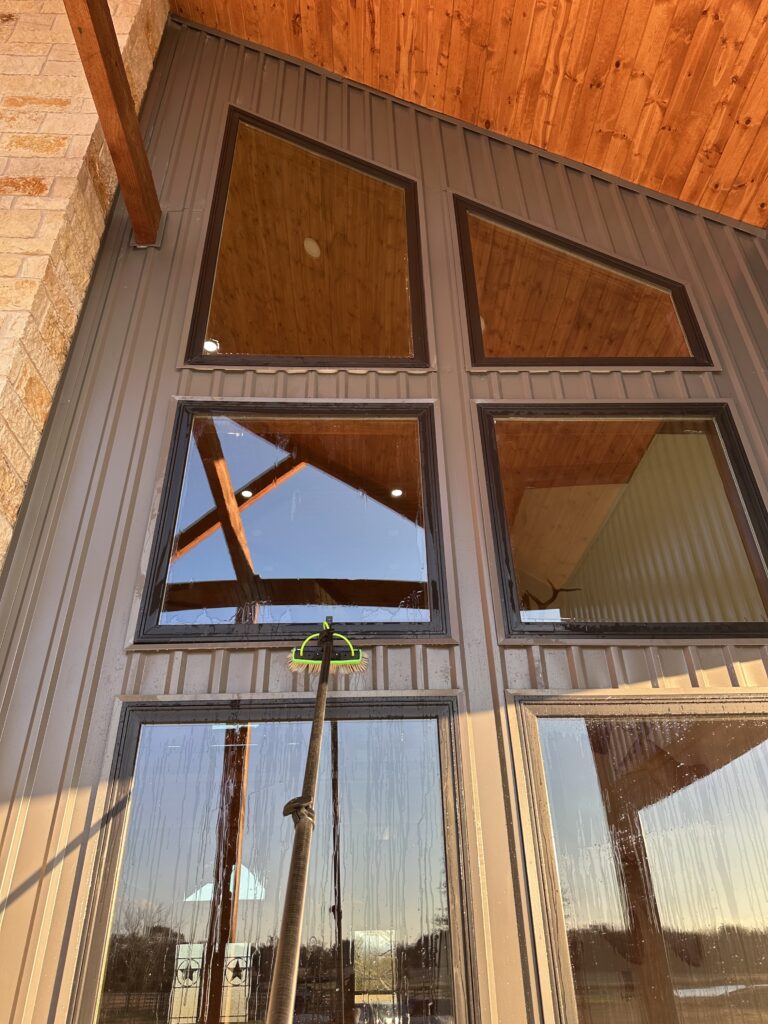 Window cleaning on tall gable windows in Caldwell TX