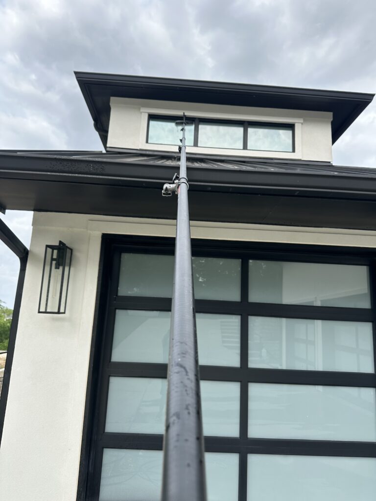 Garage door glass cleaning in the Traditions neighborhood in Bryan TX