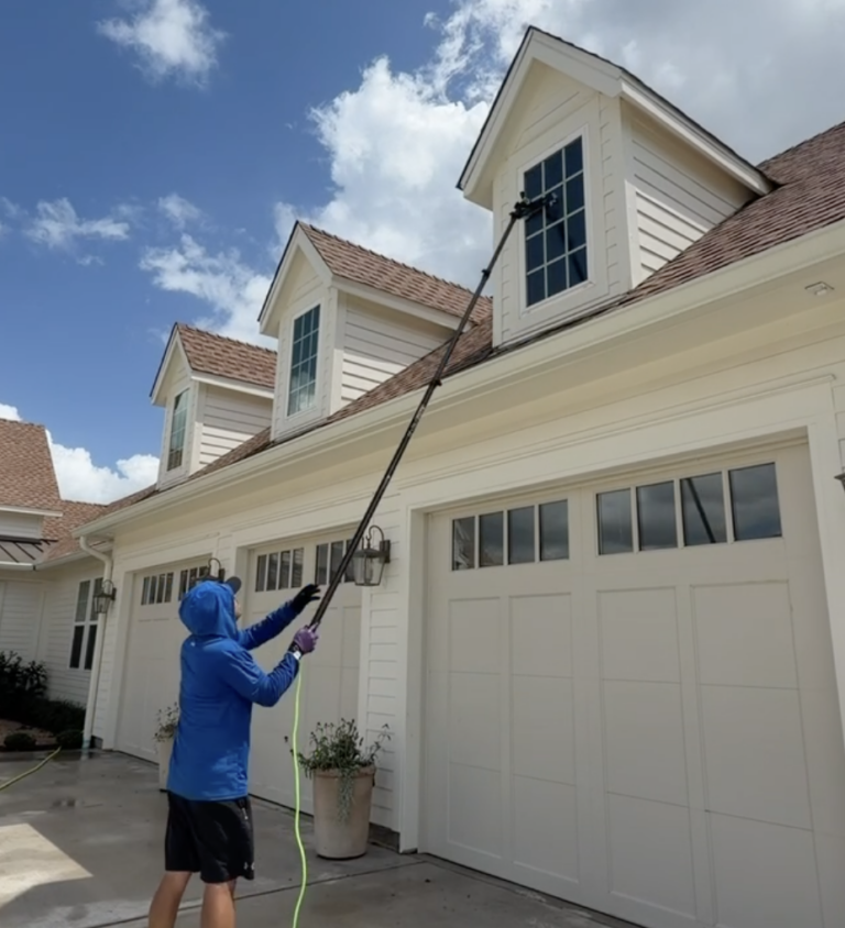 Window cleaning on a home in Brenham TX