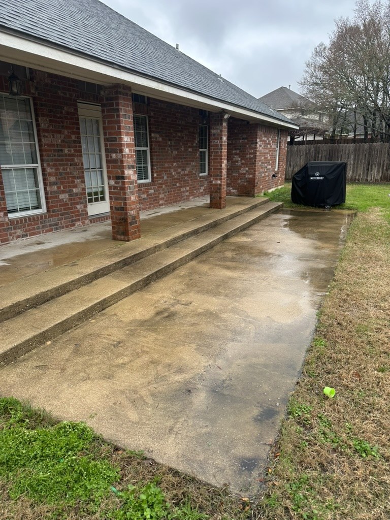 Back patio before pressure washing in College Station, TX