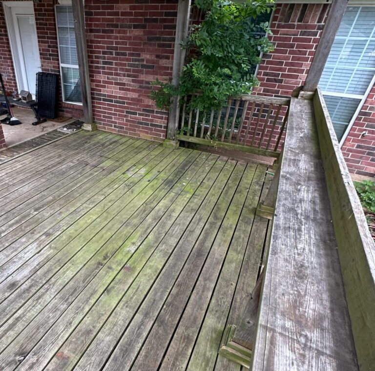 Heavy tree pollen and grime buildup on a wood deck in College Station