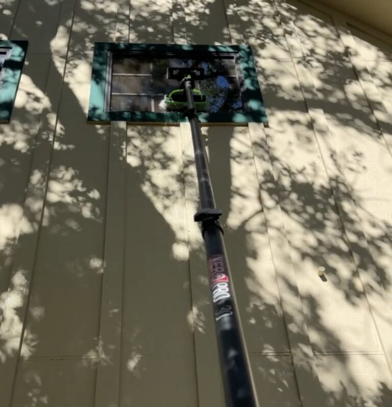 Water-fed pole window cleaning after a house wash in Hearne TX