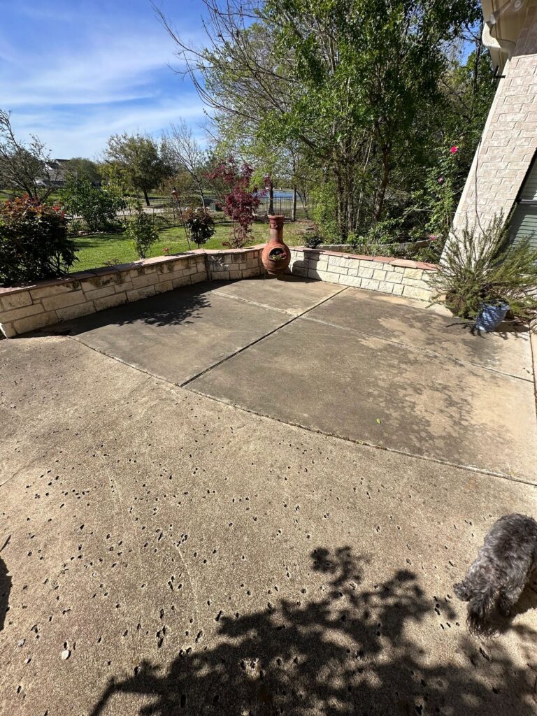 Patio before pressure washing in College Station, TX